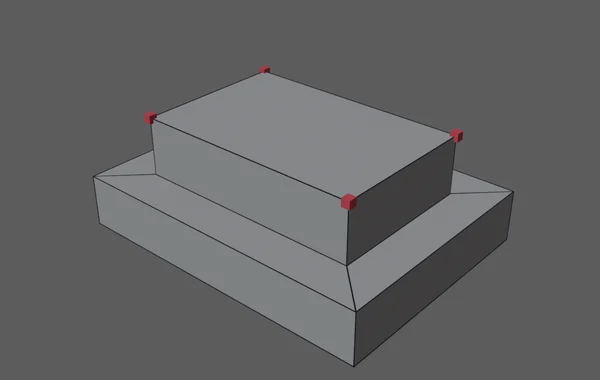 A block in the Maya viewport with the stacked points of a double extrude highlighted in red