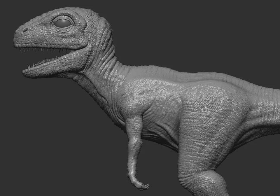 Close-up of the raptor sculpt's head, neck and arm, showing scale detail